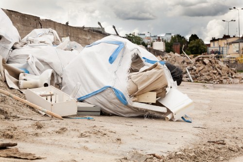 Raynes Park flat clearance services