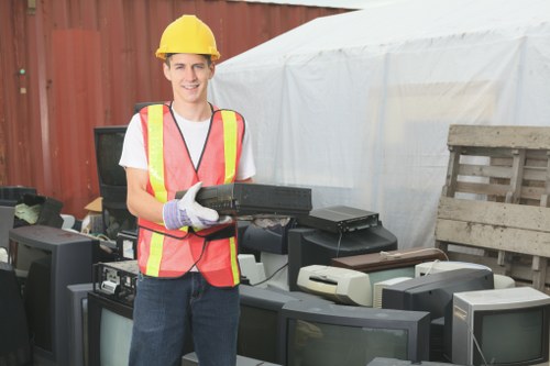 Professional waste collectors in Raynes Park